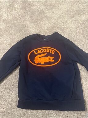 Lacoste Navy Crewneck Sweatshirt with Orange Logo Emblem